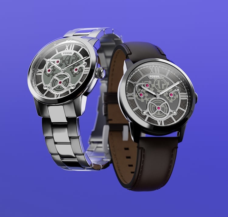 The Fossil Townsman Big Tic watch shown against a kaleidoscopic background.