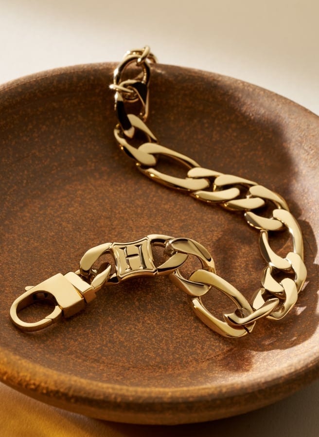Gold-tone Harry Potter x Fossil chain with 'h' link.
