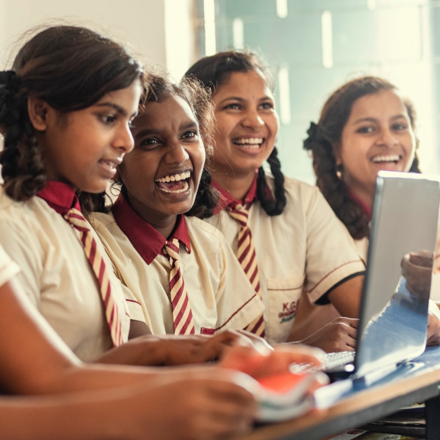 School children working at a computer