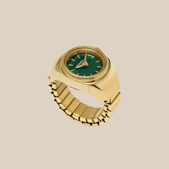 Gold-tone watch ring with green dial.