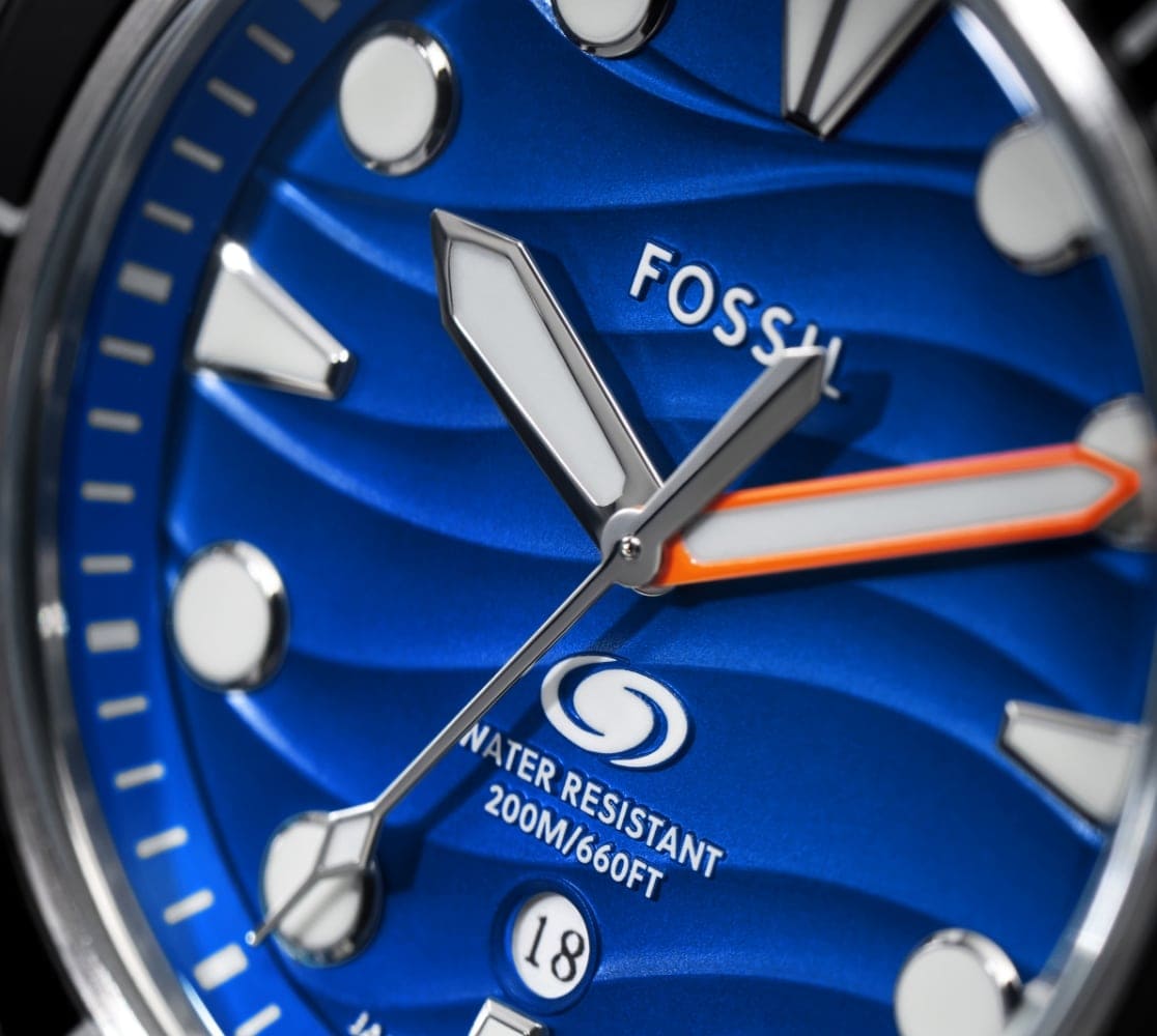Closeup of the Fossil Breaker's wave textured dial.