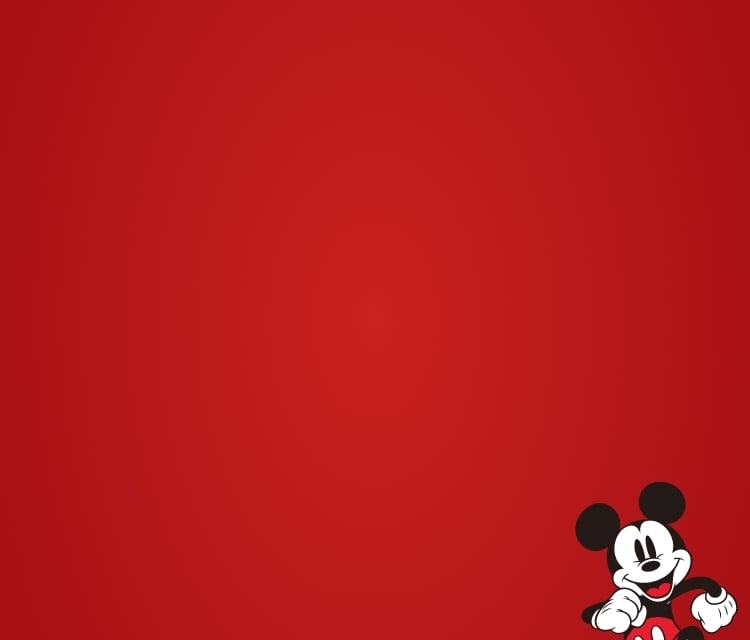 Ein rotes Banner mit einer Grafik von Disneys Micky Maus, der fröhlich am unteren Rand marschiert.