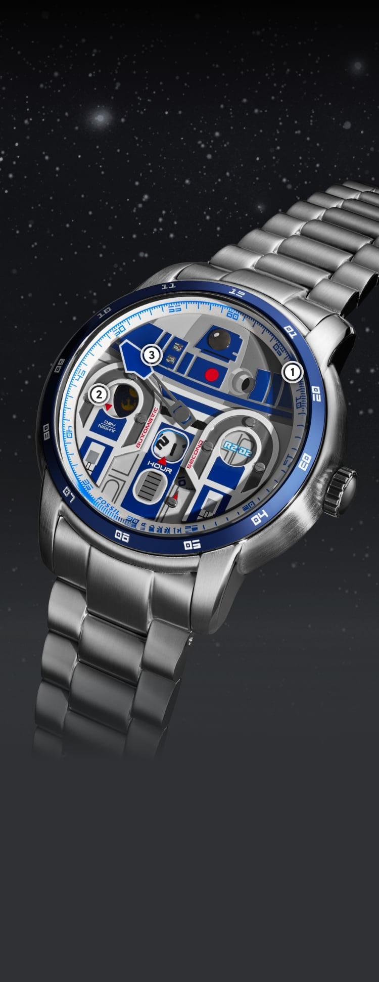A close-up shot of a silver-tone watch with a dimensional appliqué of R2-D2 on the dial