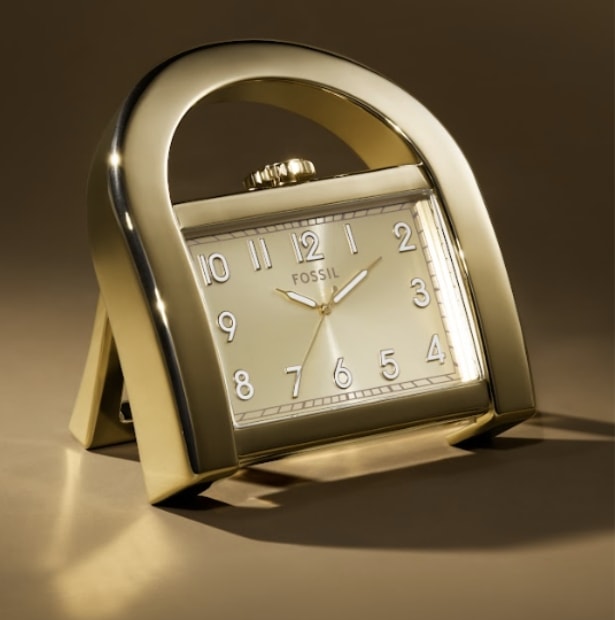 The gold-tone desk clock.