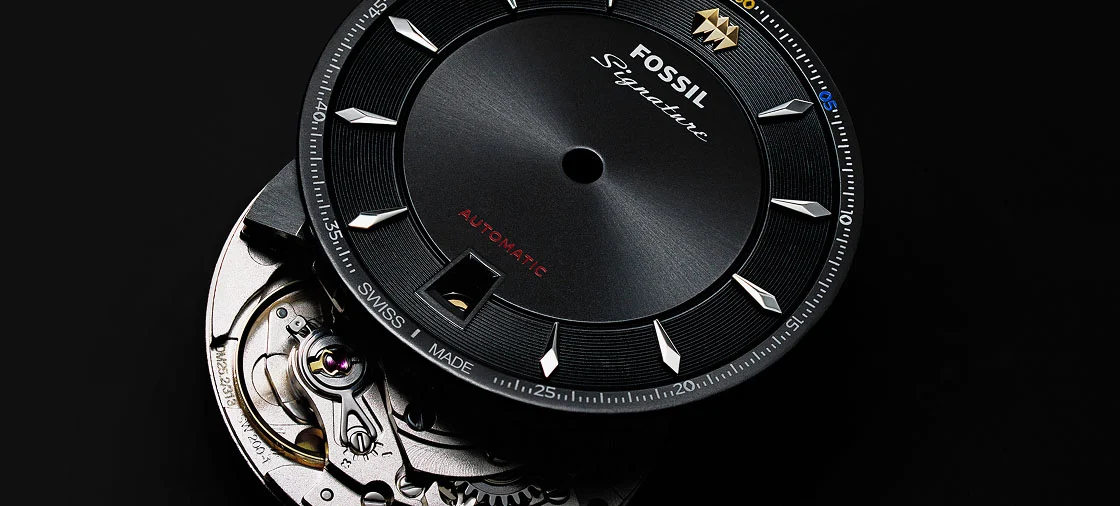 Close-up image of the mechanics of a disassembled dial of a Signature CS-1 watch.