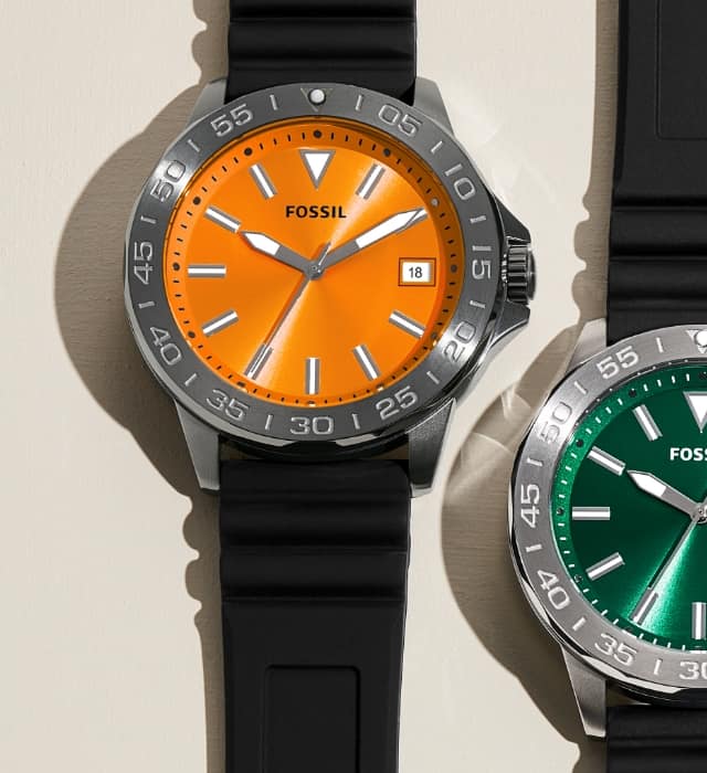 Men’s sporty watches with a black strap and colourful dials in orange, green, red, yellow and blue.