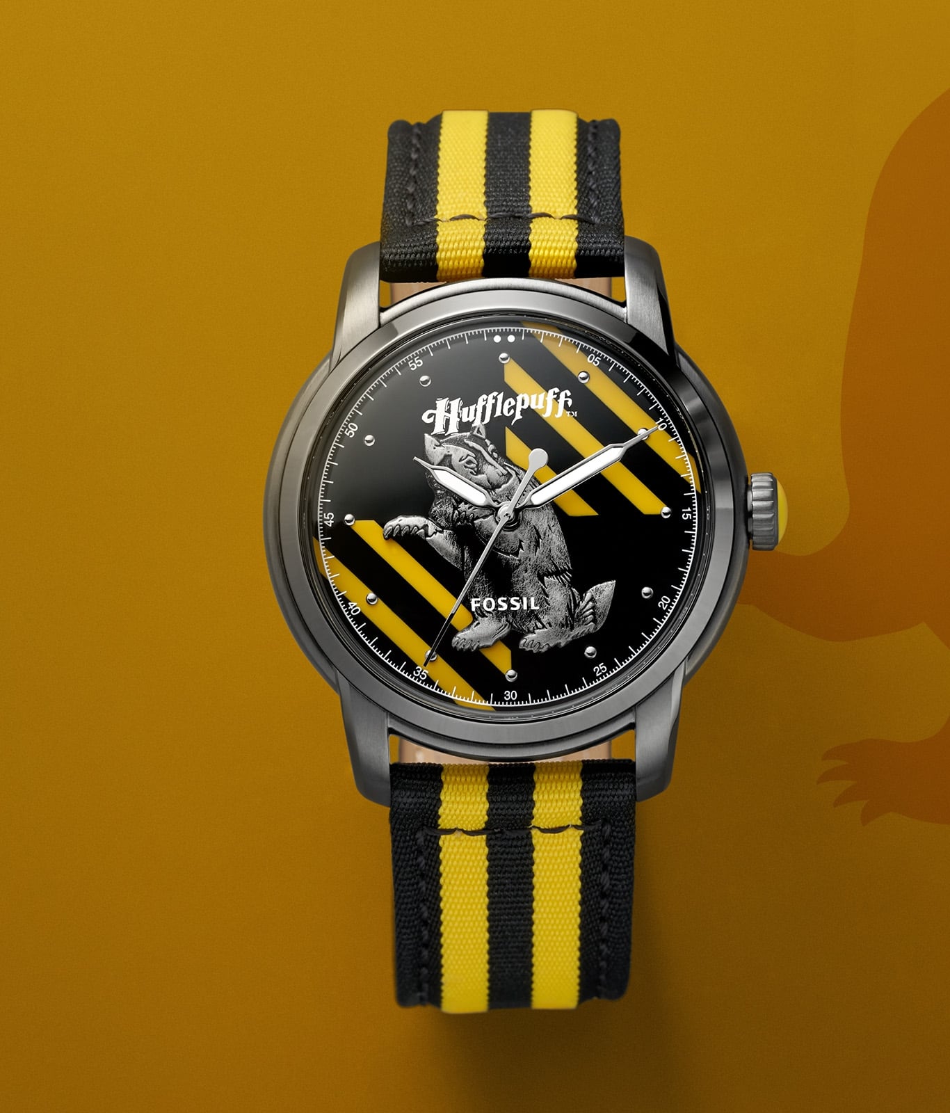 Silver-tone Hufflepuff house watch with a yellow and black strap.