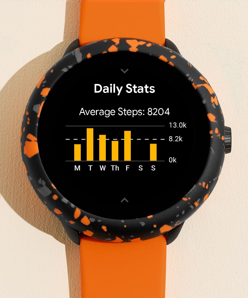 The Gen 6 Wellness Smartwatch gift set, featuring a black silicone strap and orange interchangeable bumper.