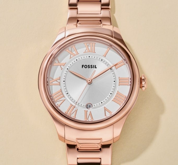 A classic women's watch featuring a round dial with Roman numerals and a rose-gold finish.