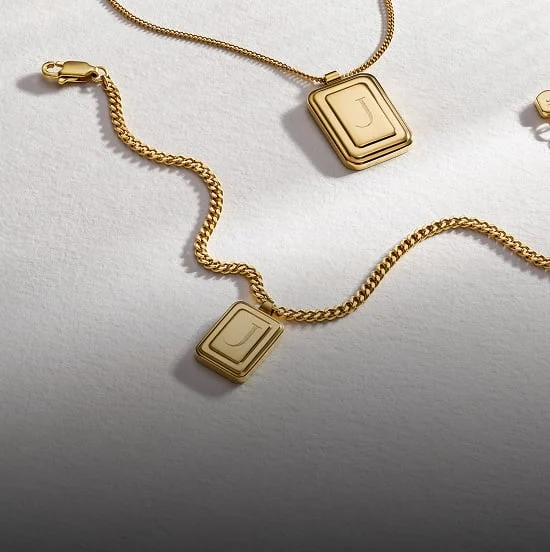 Two gold-tone Fossil Raquel watches shown in the classic size and new mini 18mm case.