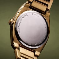 The caseback of a watch, waiting to be engraved.