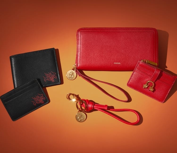 Five leather wallets and accessories from the Lunar New Year collection.