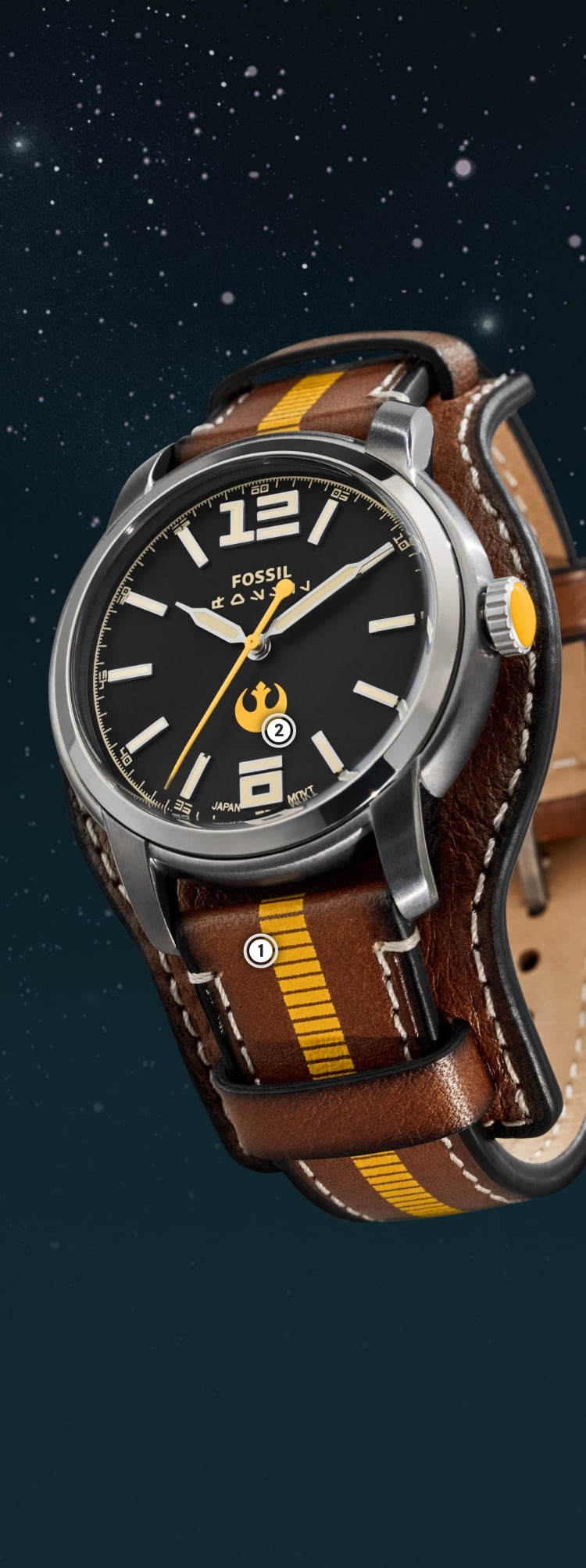 A close-up of a silver-tone watch on a brown leather saddle strap with yellow-gold paint detailing.