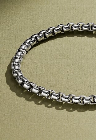 A stainless steel chain bracelet.