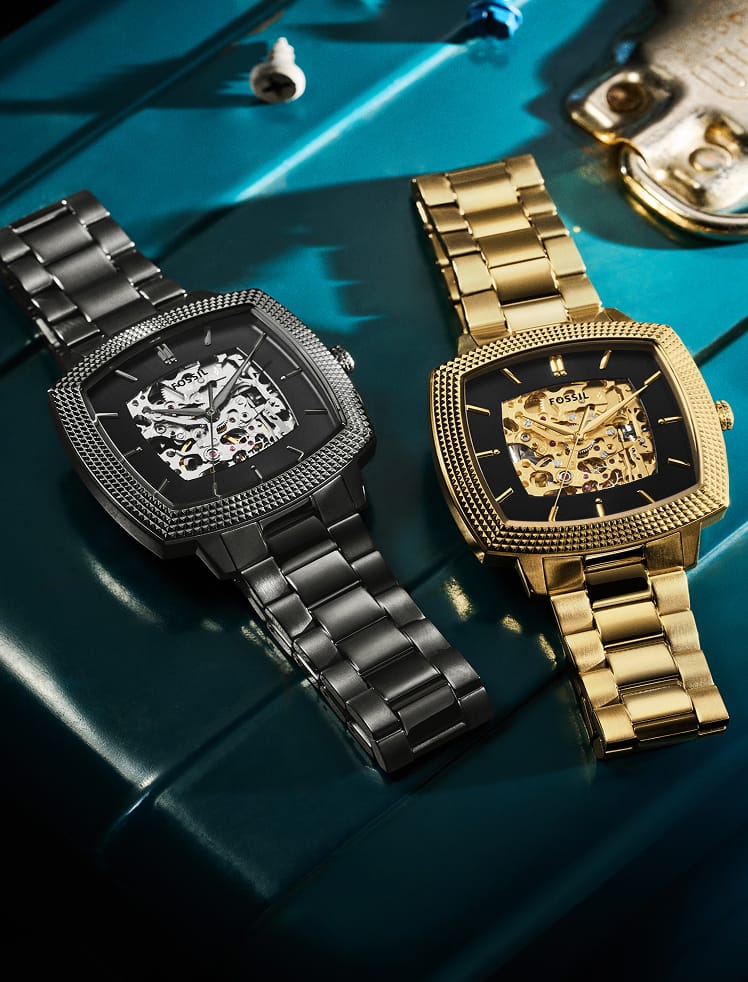 A close-up of two Machine Luxe automatic watches.