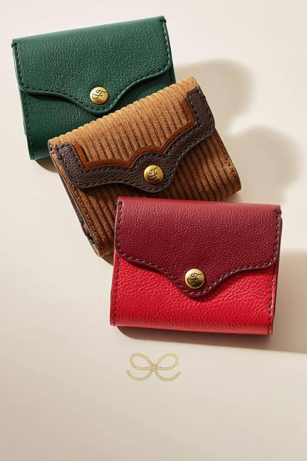 Three leather wallets.