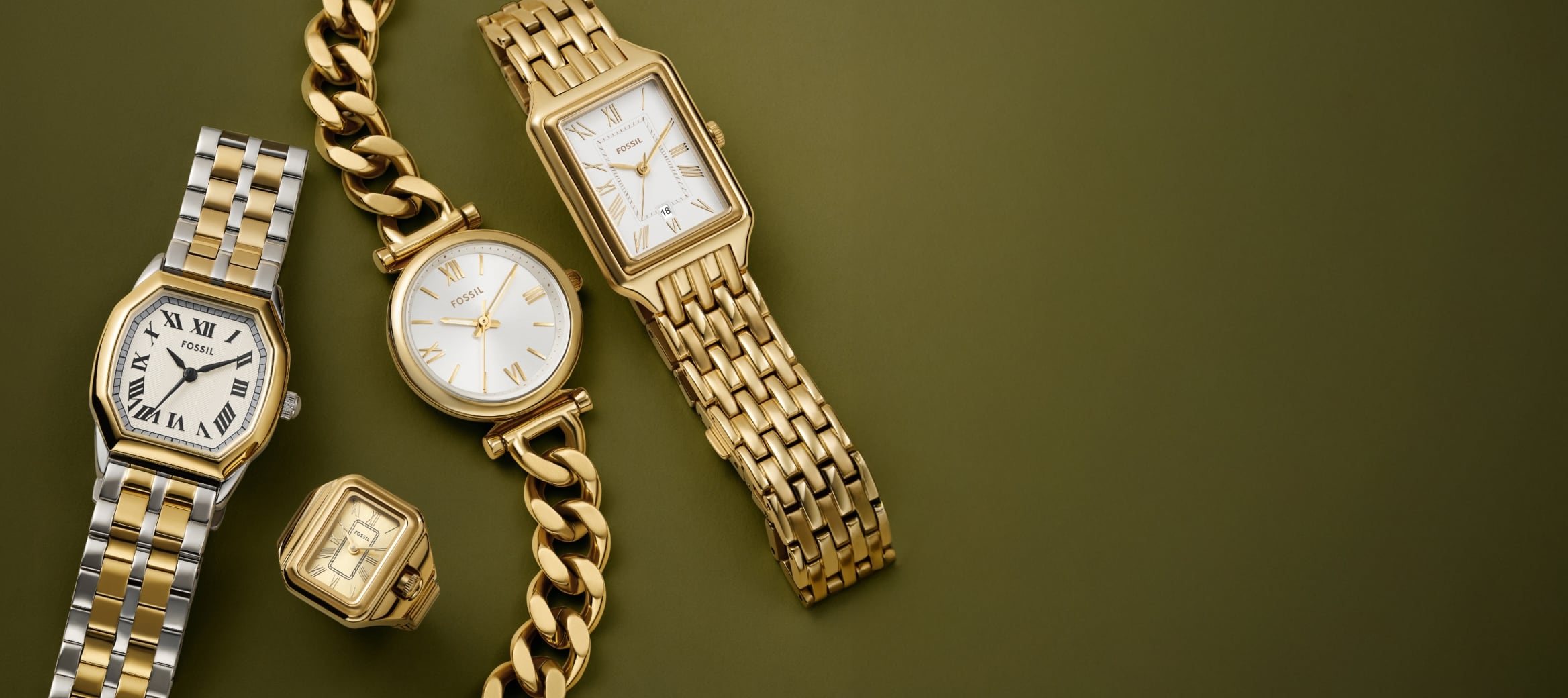 A row of men's watches featuring a variety of movement types, dials and bracelets.