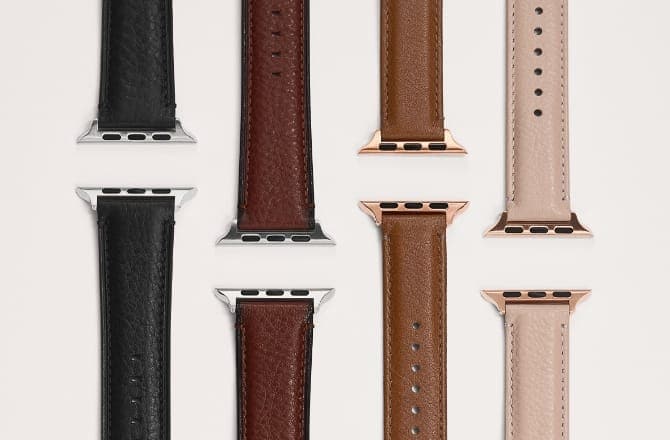 A black leather watch strap, a dark brown leather watch strap, a light brown leather watch strap and a pink leather watch strap