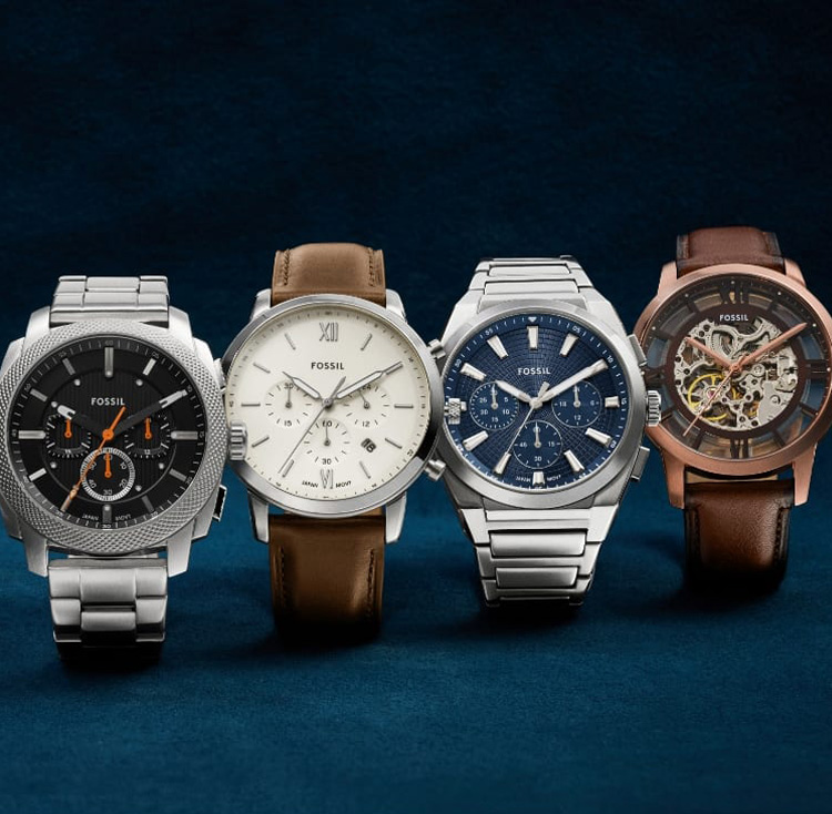 Four men's watches, including the Fossil Blue, Fossil Blue GMT, Breaker and Sport Tourer.