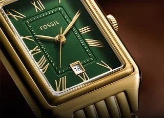 The elegant Raquel watch, defined by its signature rectangular case, in a green and gold-tone finish.