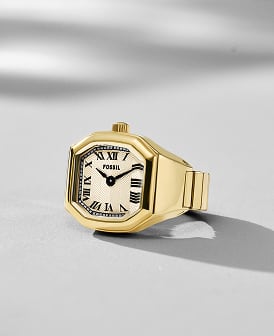 Abbildung einer goldfarbenen Ringuhr von Fossil