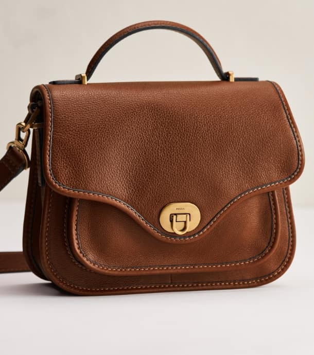 A brown leather Fossil Heritage Handbag.