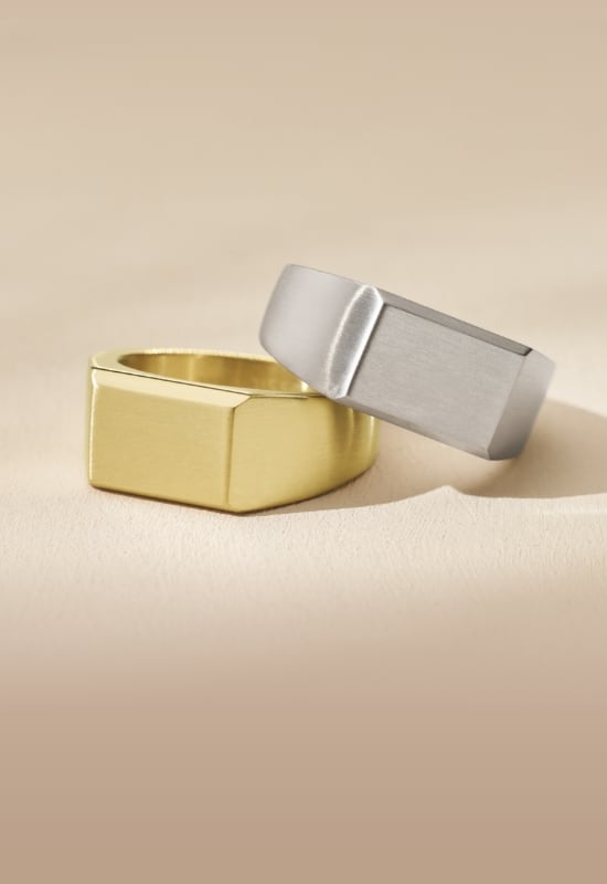 Men's gold-tone and silver-tone rings.